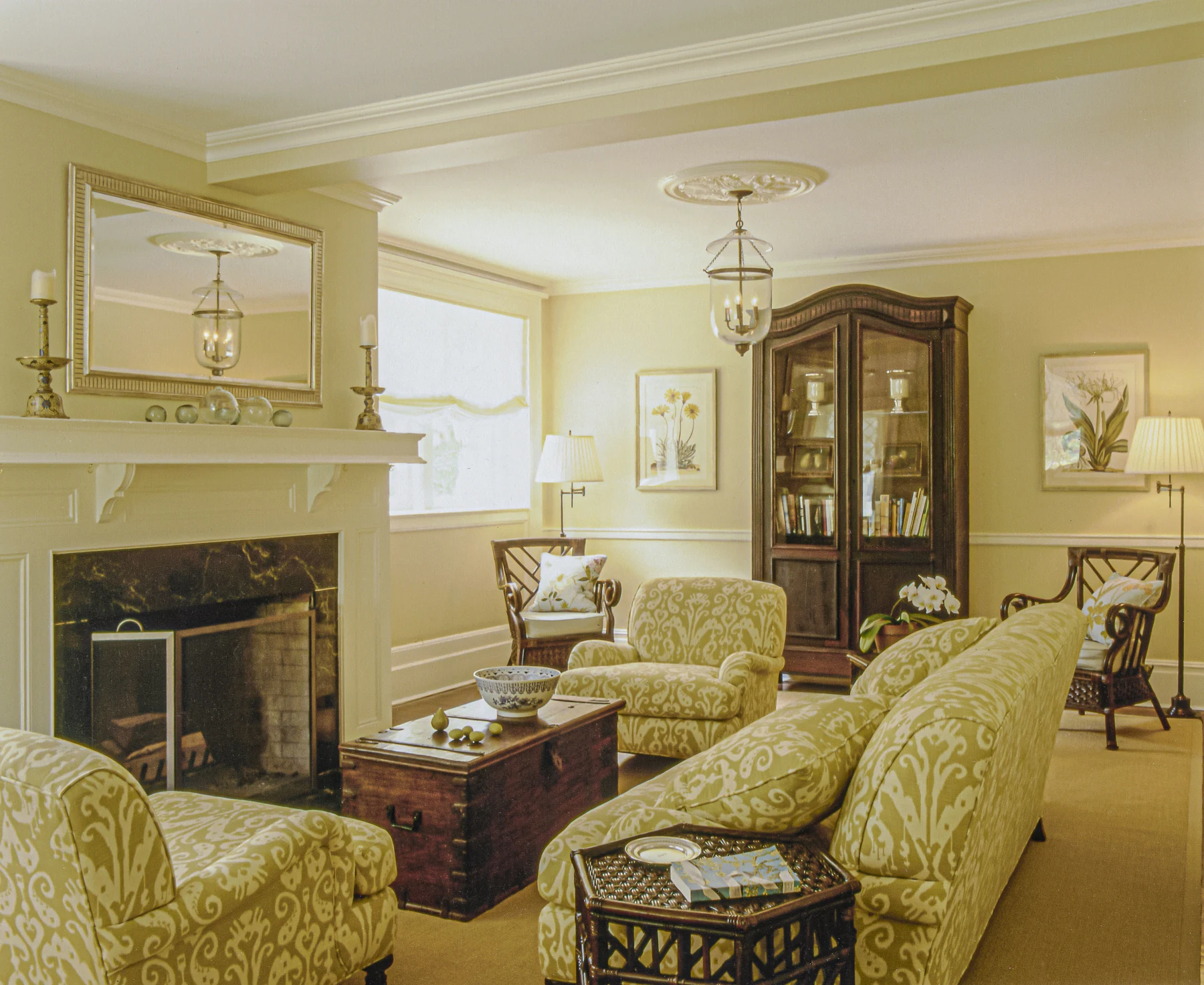 Living area with warm walls and antique furnishings, Hudson Valley