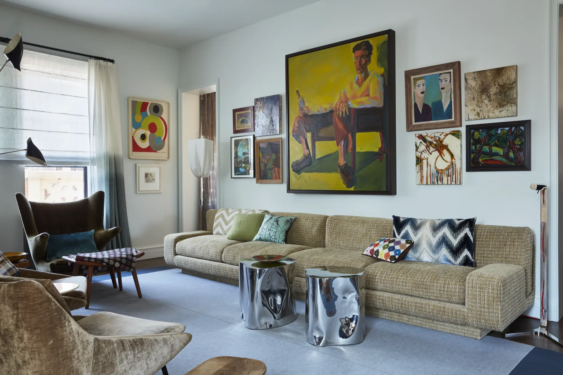 Open-plan living space with deep woad tones and old-world craft, Chelsea loft