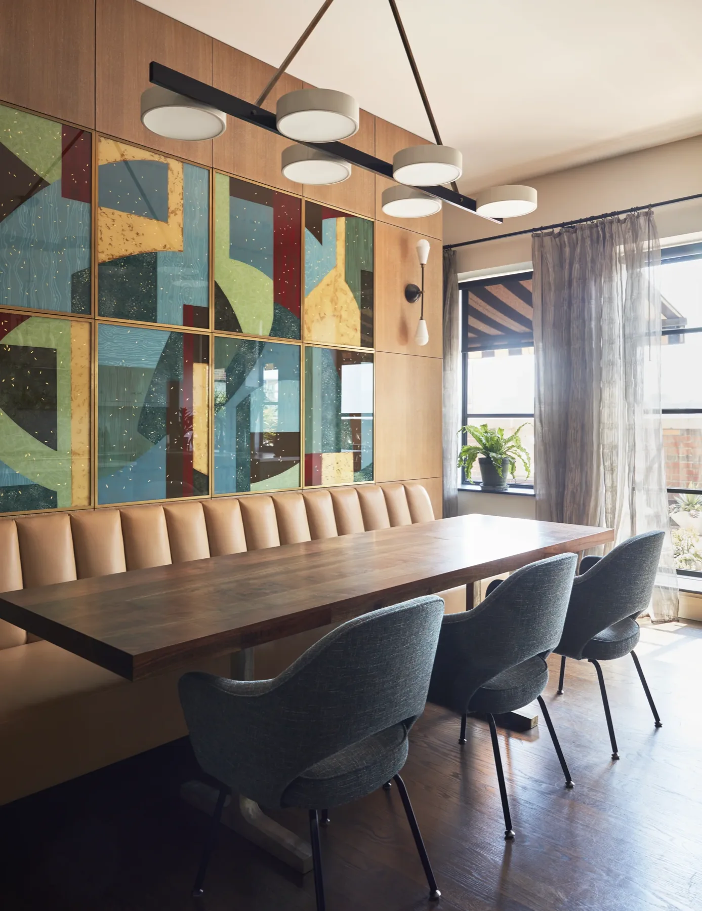 Detail of aged patina and woad-blue upholstery in a New York loft