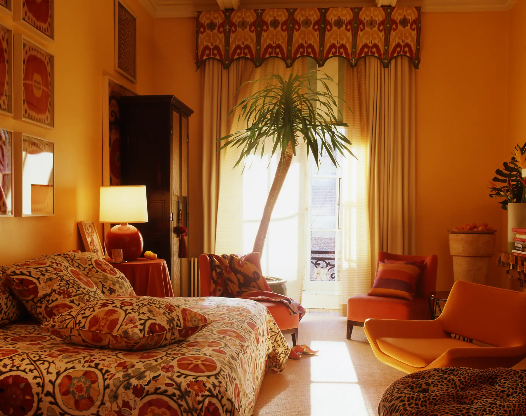 Curated vignette of antique vessels and layered pattern in a Manhattan residence