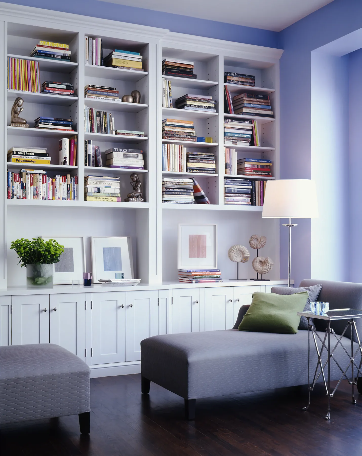 Violet-saturated drawing room with collected antiques and bohemian layering, New York