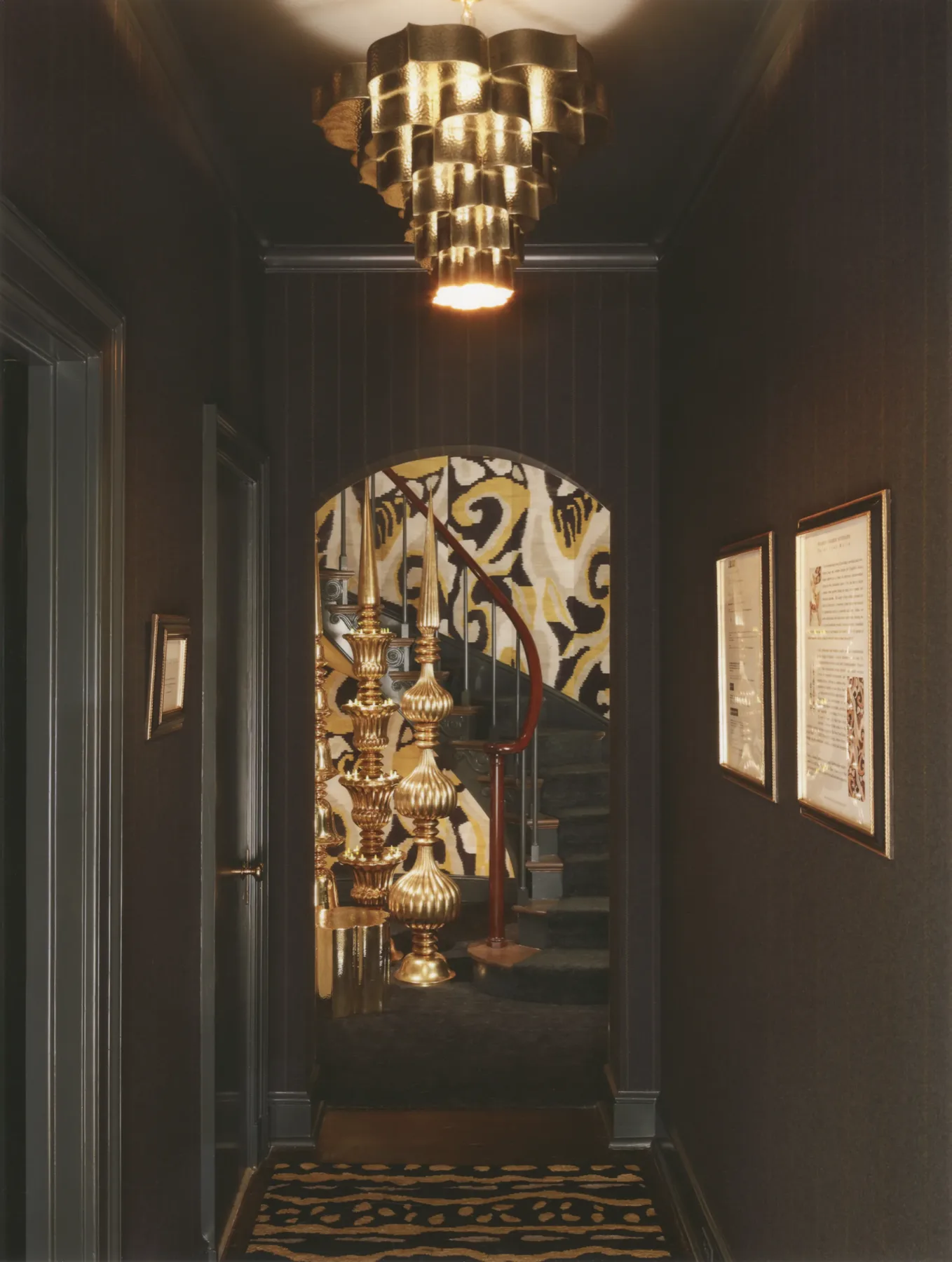 Richly layered interior in graphite and gold at the Kips Bay Show House, New York