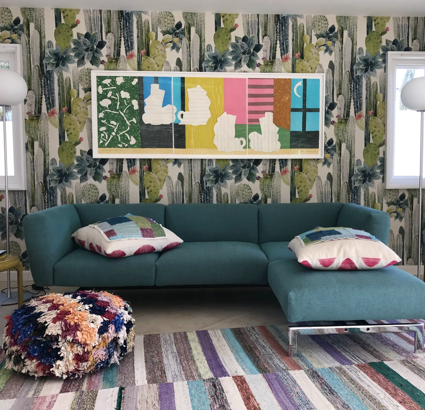 Curated vignette of bold color, antiques and collected objects in a California home